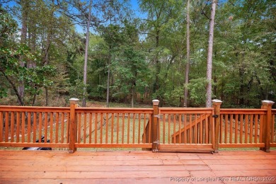 Step inside this charming 3-bedroom, 2-bath home featuring a on Carolina Lakes Country Club in North Carolina - for sale on GolfHomes.com, golf home, golf lot