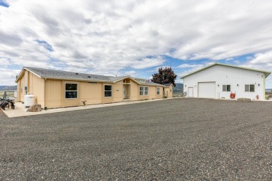 **Stunning Three-Bedroom Home on Lake Roosevelt!**  Discover on Deer Meadows Golf Course in Washington - for sale on GolfHomes.com, golf home, golf lot
