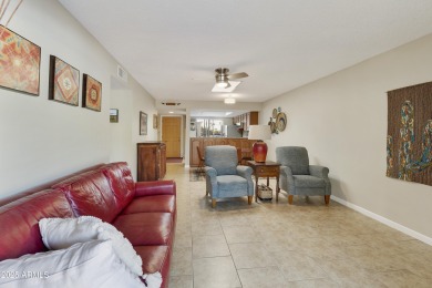 Step into this beautifully updated, move-in-ready end unit in on Fountain of the Sun Country Club in Arizona - for sale on GolfHomes.com, golf home, golf lot