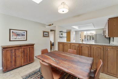 Step into this beautifully updated, move-in-ready end unit in on Fountain of the Sun Country Club in Arizona - for sale on GolfHomes.com, golf home, golf lot