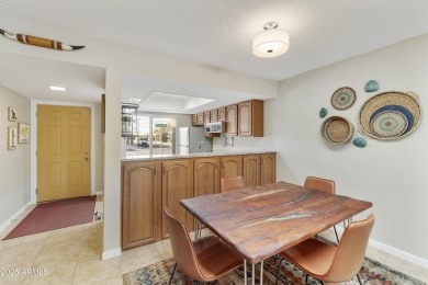 Step into this beautifully updated, move-in-ready end unit in on Fountain of the Sun Country Club in Arizona - for sale on GolfHomes.com, golf home, golf lot