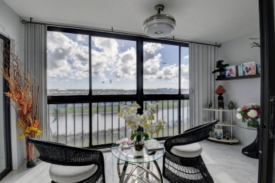 Beautiful corner unit, completely renovated, impact windows 3/8 on Marina Lakes Golf Course in Florida - for sale on GolfHomes.com, golf home, golf lot
