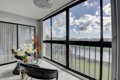 Beautiful corner unit, completely renovated, impact windows 3/8 on Marina Lakes Golf Course in Florida - for sale on GolfHomes.com, golf home, golf lot