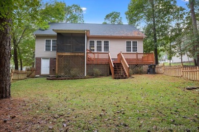Step inside this charming 3-bedroom, 2-bath home featuring a on Carolina Lakes Country Club in North Carolina - for sale on GolfHomes.com, golf home, golf lot