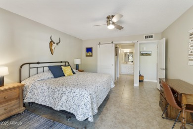 Step into this beautifully updated, move-in-ready end unit in on Fountain of the Sun Country Club in Arizona - for sale on GolfHomes.com, golf home, golf lot