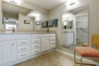 Step into this beautifully updated, move-in-ready end unit in on Fountain of the Sun Country Club in Arizona - for sale on GolfHomes.com, golf home, golf lot