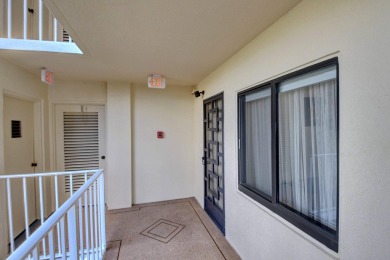 Beautiful corner unit, completely renovated, impact windows 3/8 on Marina Lakes Golf Course in Florida - for sale on GolfHomes.com, golf home, golf lot