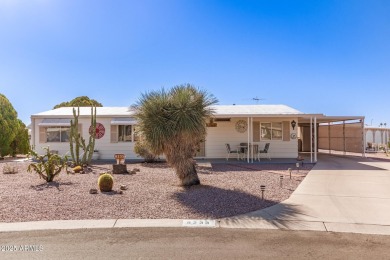 Great curb appeal to this partially furnished split floorplan 2 on Fountain of the Sun Country Club in Arizona - for sale on GolfHomes.com, golf home, golf lot