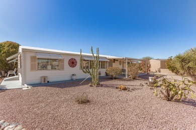 Great curb appeal to this partially furnished split floorplan 2 on Fountain of the Sun Country Club in Arizona - for sale on GolfHomes.com, golf home, golf lot