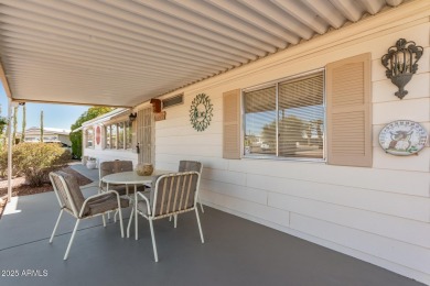 Great curb appeal to this partially furnished split floorplan 2 on Fountain of the Sun Country Club in Arizona - for sale on GolfHomes.com, golf home, golf lot