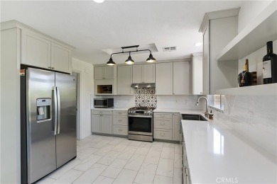 Step into your own private retreat! This beautifully crafted on Mission Lakes Country Club in California - for sale on GolfHomes.com, golf home, golf lot