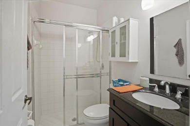 Spacious 3 bed, 3 bath home with private pool located in the on Woodmont Country Club in Florida - for sale on GolfHomes.com, golf home, golf lot