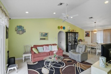 Spacious 3 bed, 3 bath home with private pool located in the on Woodmont Country Club in Florida - for sale on GolfHomes.com, golf home, golf lot