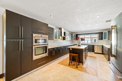 Distinguished luxury estate in South Miami, just 4 minutes from on Briar Bay Golf Course in Florida - for sale on GolfHomes.com, golf home, golf lot