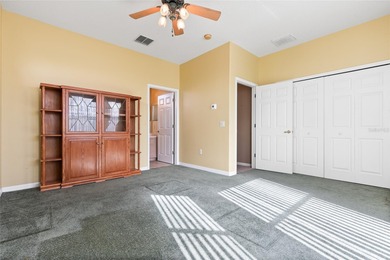 STUNNING Courtyard Home on *PRIVATE CONSERVATION* *With 2 MASTER on The Groves Golf and Country Club in Florida - for sale on GolfHomes.com, golf home, golf lot