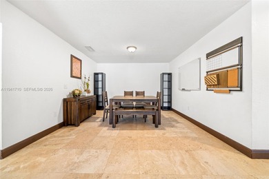 Distinguished luxury estate in South Miami, just 4 minutes from on Briar Bay Golf Course in Florida - for sale on GolfHomes.com, golf home, golf lot