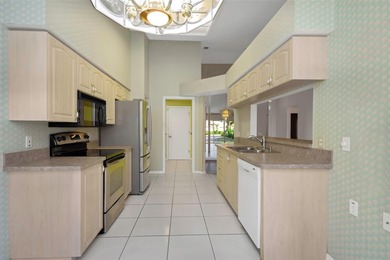 Available for immediate occupancy, this serene 2-bedroom on Highland Lakes Executive Golf Course in Florida - for sale on GolfHomes.com, golf home, golf lot