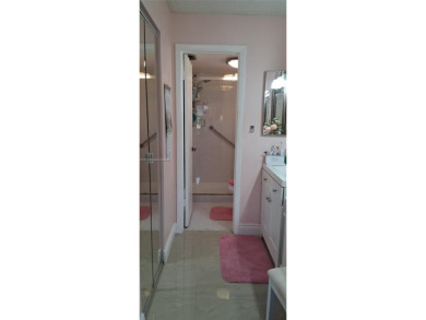 BEAUTIFUL LARGE 2 bed /2 full baths ground floor corner unit in on Sunrise Lakes Phase IV Golf Course in Florida - for sale on GolfHomes.com, golf home, golf lot