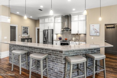 Indulge in the epitome of luxury living with this pristine on Venetian Bay Golf Course in Florida - for sale on GolfHomes.com, golf home, golf lot