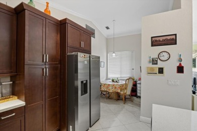 Spacious 3 bed, 3 bath home with private pool located in the on Woodmont Country Club in Florida - for sale on GolfHomes.com, golf home, golf lot