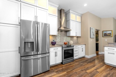 Indulge in the epitome of luxury living with this pristine on Venetian Bay Golf Course in Florida - for sale on GolfHomes.com, golf home, golf lot