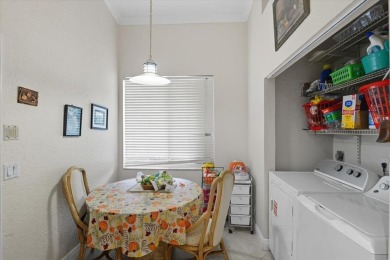 Spacious 3 bed, 3 bath home with private pool located in the on Woodmont Country Club in Florida - for sale on GolfHomes.com, golf home, golf lot