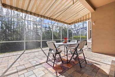 STUNNING Courtyard Home on *PRIVATE CONSERVATION* *With 2 MASTER on The Groves Golf and Country Club in Florida - for sale on GolfHomes.com, golf home, golf lot