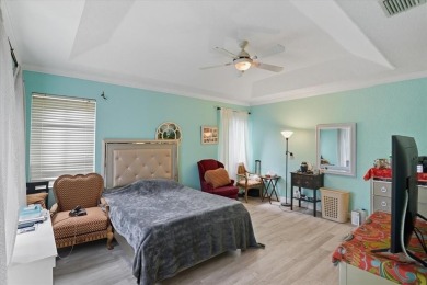 Spacious 3 bed, 3 bath home with private pool located in the on Woodmont Country Club in Florida - for sale on GolfHomes.com, golf home, golf lot