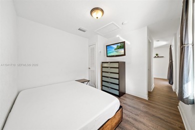 Distinguished luxury estate in South Miami, just 4 minutes from on Briar Bay Golf Course in Florida - for sale on GolfHomes.com, golf home, golf lot