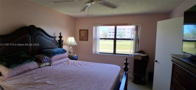 BEAUTIFUL LARGE 2 bed /2 full baths ground floor corner unit in on Sunrise Lakes Phase IV Golf Course in Florida - for sale on GolfHomes.com, golf home, golf lot