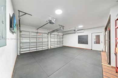 Distinguished luxury estate in South Miami, just 4 minutes from on Briar Bay Golf Course in Florida - for sale on GolfHomes.com, golf home, golf lot