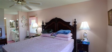 BEAUTIFUL LARGE 2 bed /2 full baths ground floor corner unit in on Sunrise Lakes Phase IV Golf Course in Florida - for sale on GolfHomes.com, golf home, golf lot