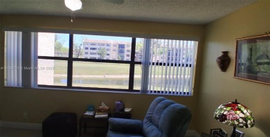 BEAUTIFUL LARGE 2 bed /2 full baths ground floor corner unit in on Sunrise Lakes Phase IV Golf Course in Florida - for sale on GolfHomes.com, golf home, golf lot