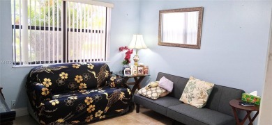 BEAUTIFUL LARGE 2 bed /2 full baths ground floor corner unit in on Sunrise Lakes Phase IV Golf Course in Florida - for sale on GolfHomes.com, golf home, golf lot