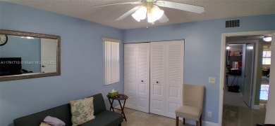 BEAUTIFUL LARGE 2 bed /2 full baths ground floor corner unit in on Sunrise Lakes Phase IV Golf Course in Florida - for sale on GolfHomes.com, golf home, golf lot