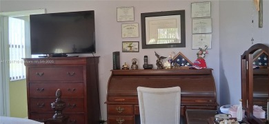 BEAUTIFUL LARGE 2 bed /2 full baths ground floor corner unit in on Sunrise Lakes Phase IV Golf Course in Florida - for sale on GolfHomes.com, golf home, golf lot
