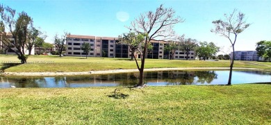 BEAUTIFUL LARGE 2 bed /2 full baths ground floor corner unit in on Sunrise Lakes Phase IV Golf Course in Florida - for sale on GolfHomes.com, golf home, golf lot