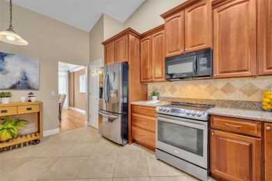 Welcome to this beautifully maintained 4-bedroom, 3-bathroom on Twin Rivers Golf Club in Florida - for sale on GolfHomes.com, golf home, golf lot