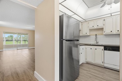 MOTIVATED SELLER! Spacious 2BR/2BA second-floor condo in the on Oriole Golf and Tennis Club in Florida - for sale on GolfHomes.com, golf home, golf lot