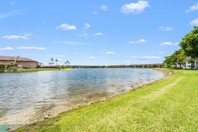 Paradise awaits! Bright and beautiful first floor unit with on Flamingo Lakes Country Club in Florida - for sale on GolfHomes.com, golf home, golf lot