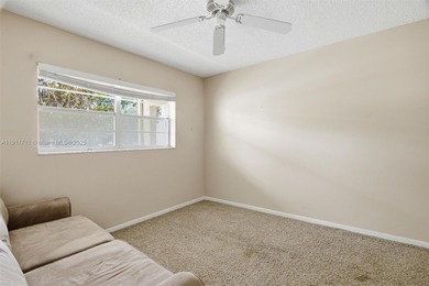 MOTIVATED SELLER! Spacious 2BR/2BA second-floor condo in the on Oriole Golf and Tennis Club in Florida - for sale on GolfHomes.com, golf home, golf lot