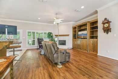 Walk out to the golf course from your large screened in back on Pecan Plantation Country Club in Texas - for sale on GolfHomes.com, golf home, golf lot
