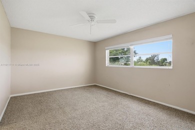 MOTIVATED SELLER! Spacious 2BR/2BA second-floor condo in the on Oriole Golf and Tennis Club in Florida - for sale on GolfHomes.com, golf home, golf lot