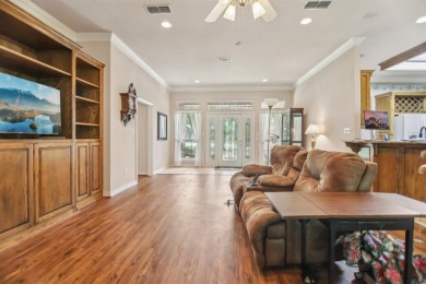 Walk out to the golf course from your large screened in back on Pecan Plantation Country Club in Texas - for sale on GolfHomes.com, golf home, golf lot