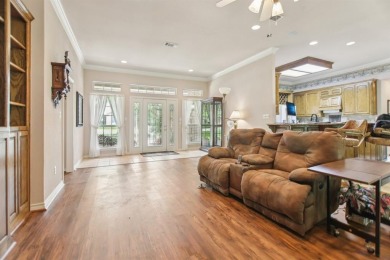 Walk out to the golf course from your large screened in back on Pecan Plantation Country Club in Texas - for sale on GolfHomes.com, golf home, golf lot