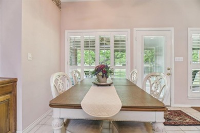 Walk out to the golf course from your large screened in back on Pecan Plantation Country Club in Texas - for sale on GolfHomes.com, golf home, golf lot