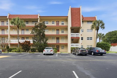 MOTIVATED SELLER! Spacious 2BR/2BA second-floor condo in the on Oriole Golf and Tennis Club in Florida - for sale on GolfHomes.com, golf home, golf lot