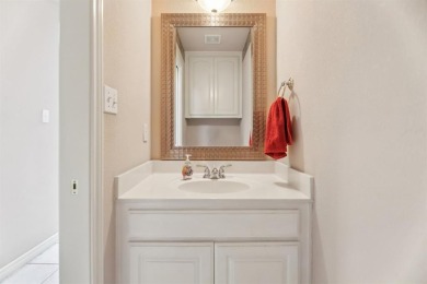 Walk out to the golf course from your large screened in back on Pecan Plantation Country Club in Texas - for sale on GolfHomes.com, golf home, golf lot