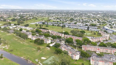 MOTIVATED SELLER! Spacious 2BR/2BA second-floor condo in the on Oriole Golf and Tennis Club in Florida - for sale on GolfHomes.com, golf home, golf lot