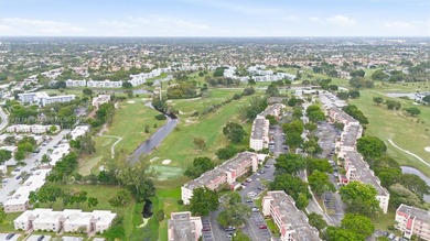 MOTIVATED SELLER! Spacious 2BR/2BA second-floor condo in the on Oriole Golf and Tennis Club in Florida - for sale on GolfHomes.com, golf home, golf lot